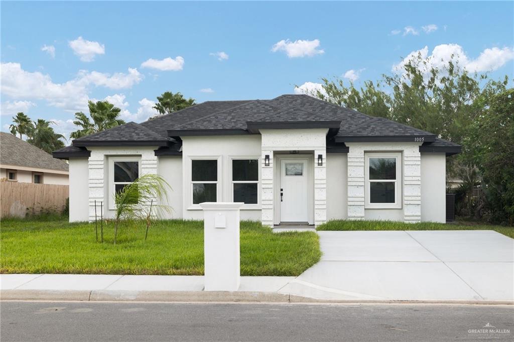 Single Family home at 1005 Dove Avenue, Pharr, Texas