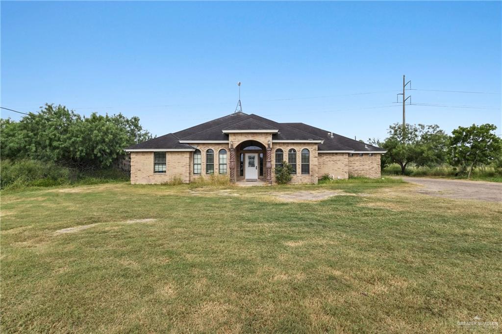 Single Family home at 11017 Mile 6 Street, Weslaco, Texas