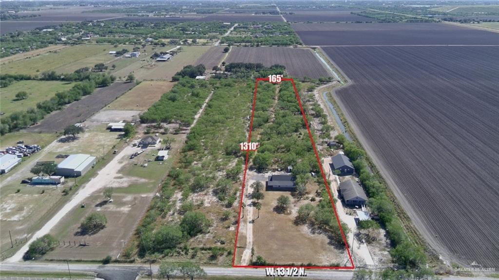 Single Family home at 2421 Mile 13 1/2, Weslaco, Texas